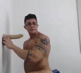 Muscular gay fuck with dildo