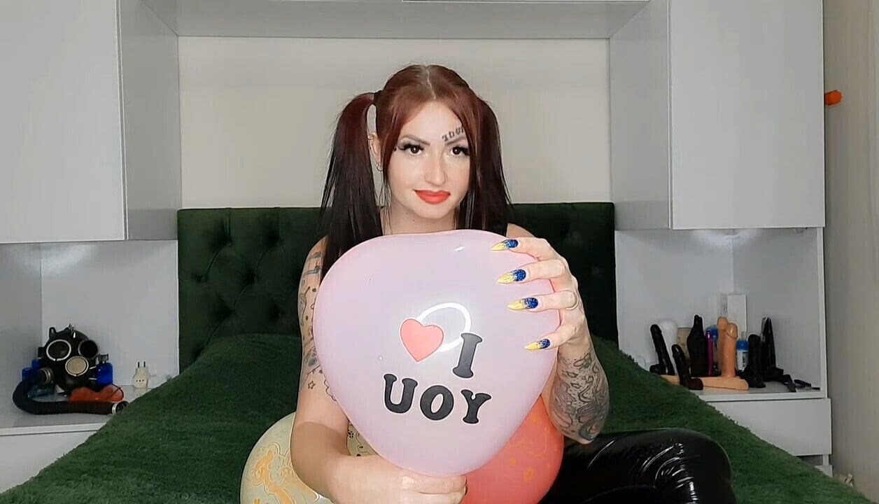 Balloons. Dominatrix Nika bursts balloons. Balloon fetish.
