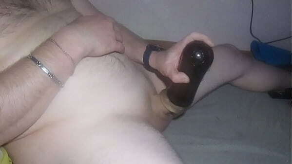 the beer boy does it with his hand and then takes a toy to help him