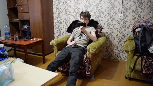 black jacket chair jerks dick cums sperm