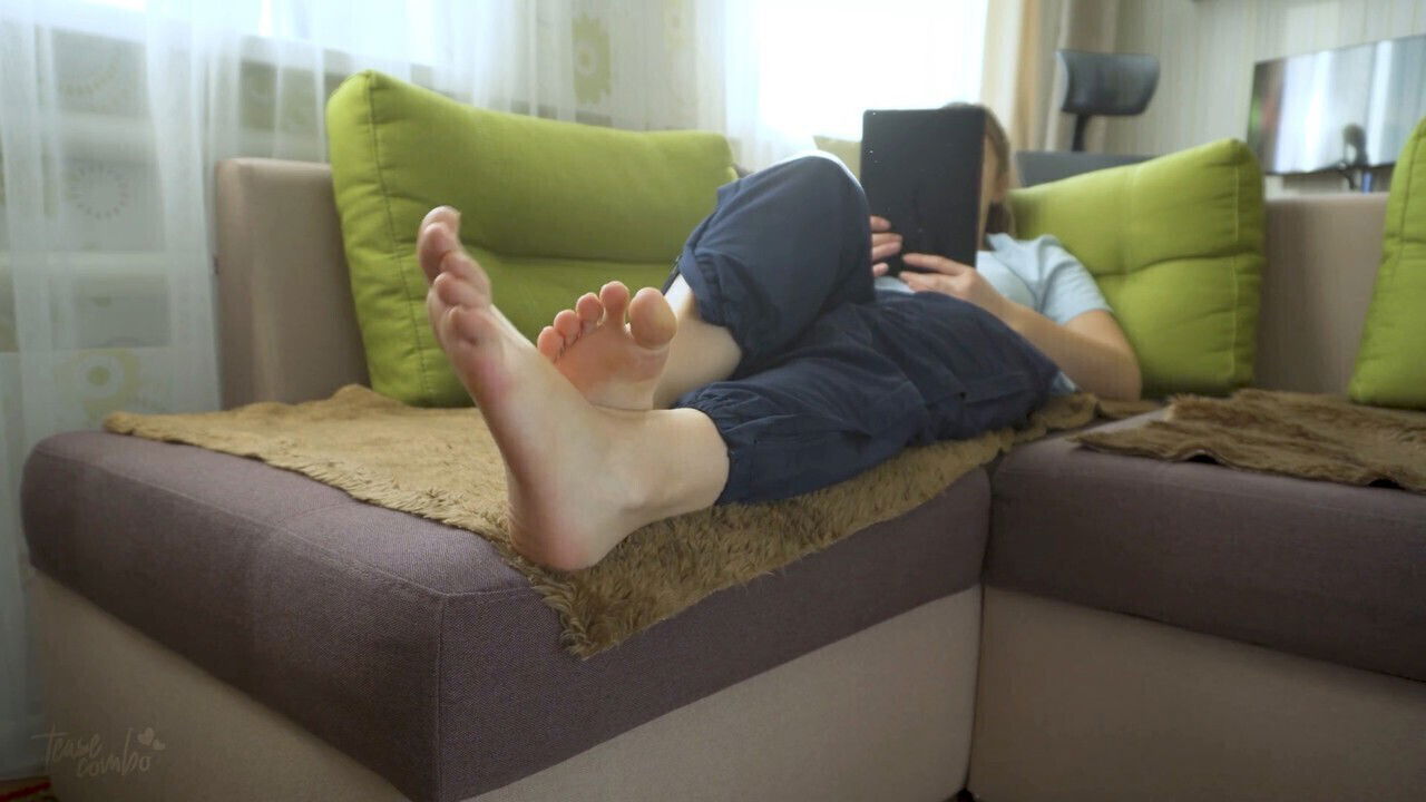 Naughty young amateur teasing foot lovers with beautiful bare soles sexy foot fetish