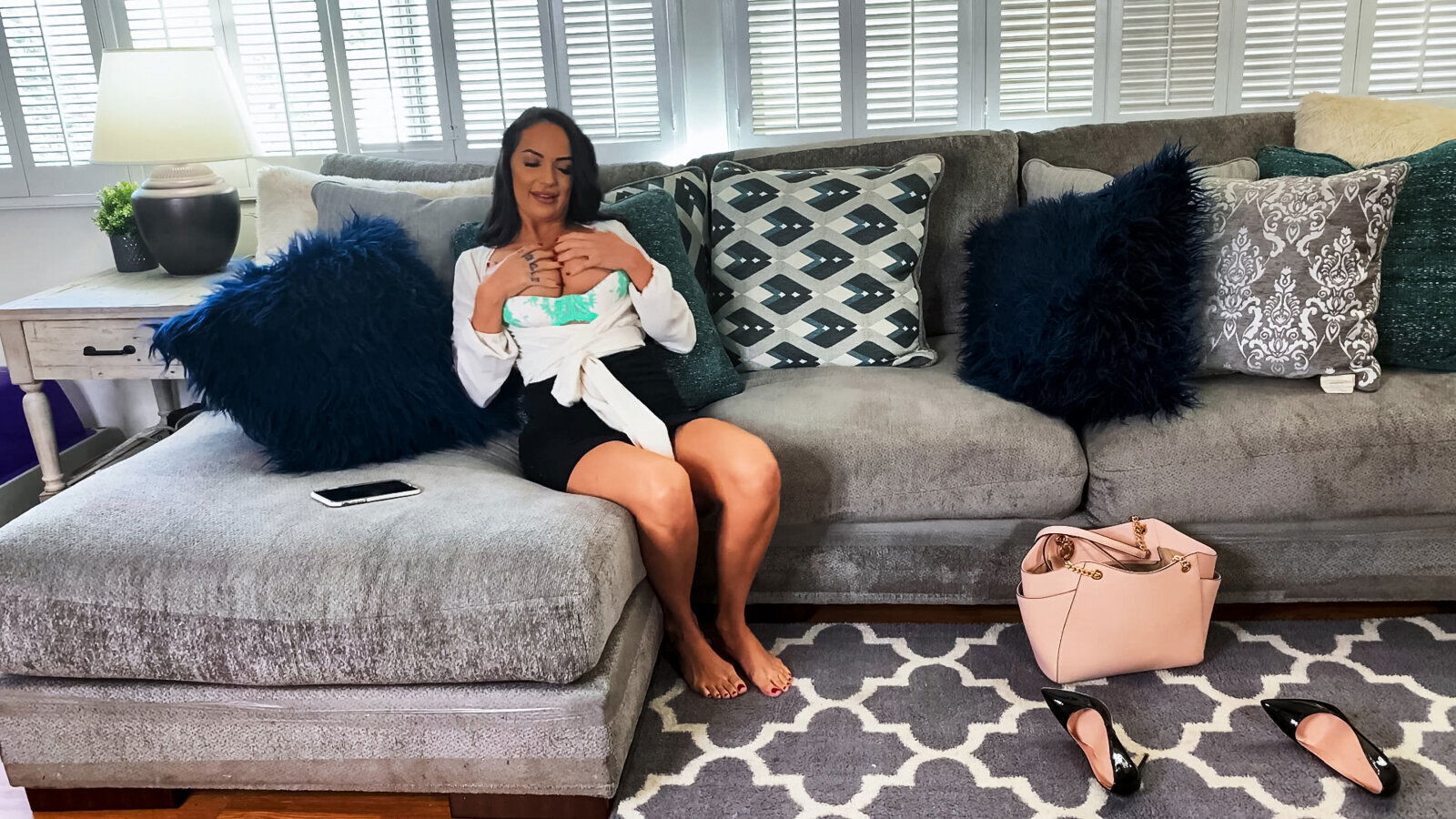 Sofi Ryan masturbates passionately couch