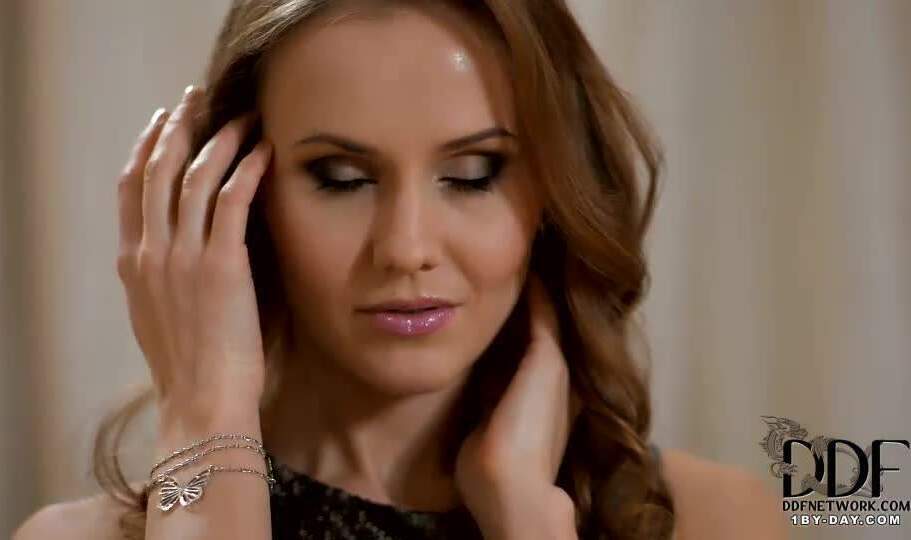 Sexy Sabina Moore looking into starts seductively rubbing skin down