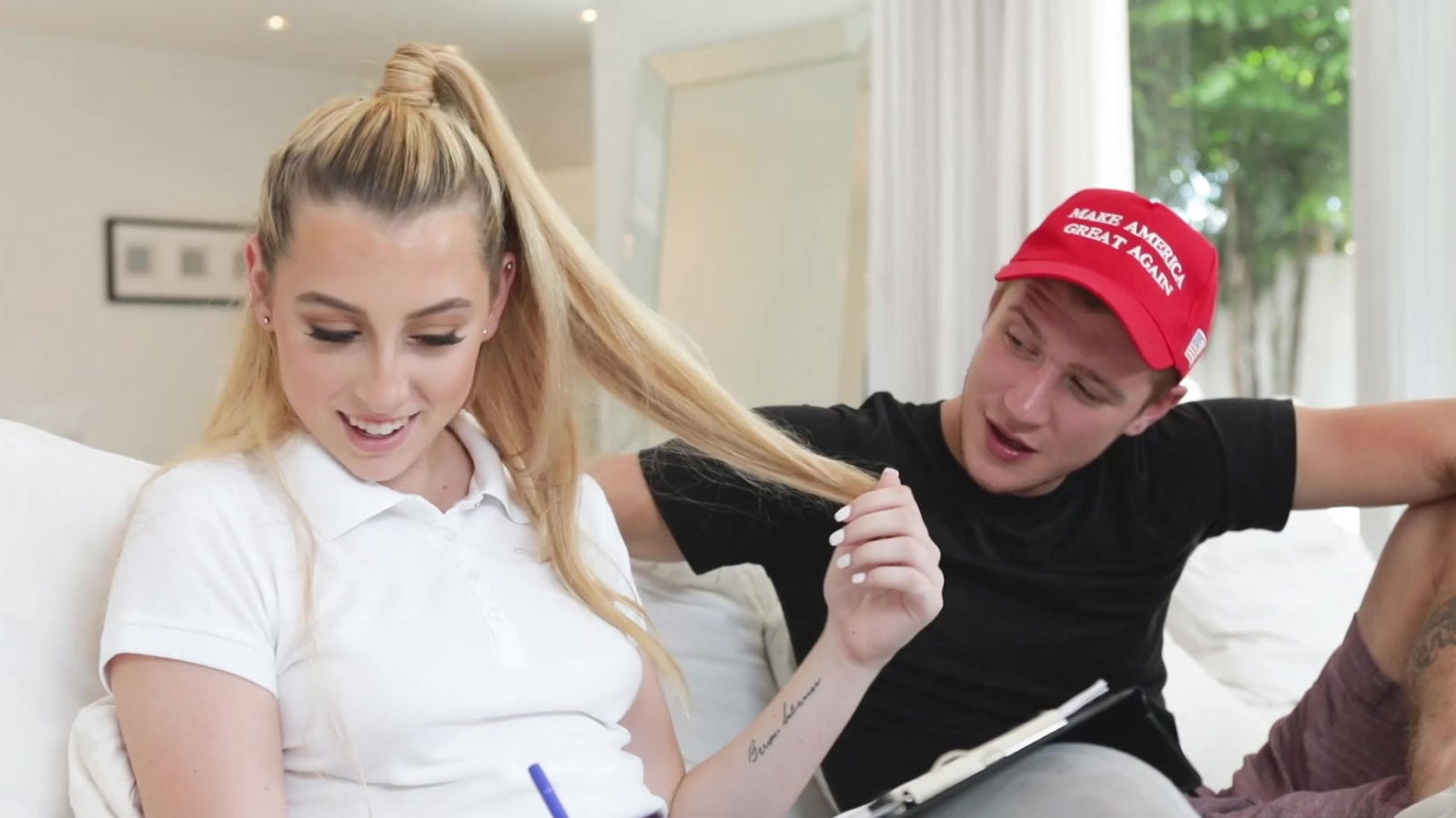 Pony-tailed teen Melody Parker spreads buns sausage