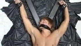 Slave ballbusted beated while tied x-cross