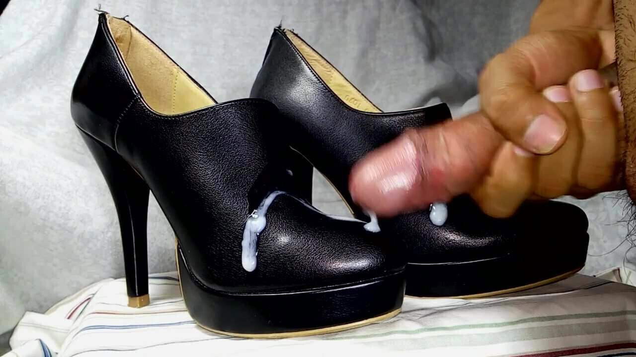 Cum in Black Leather Ankle Boots