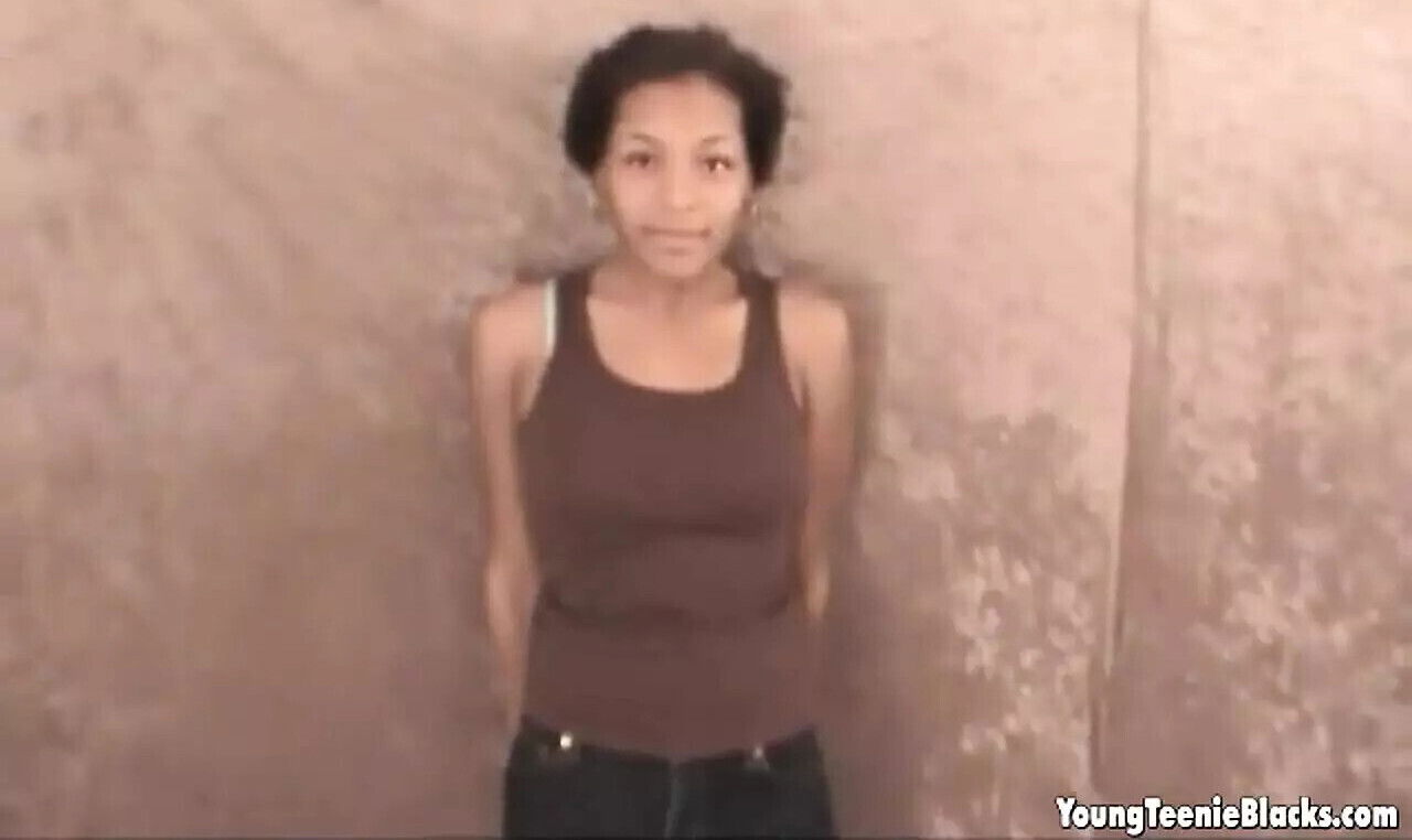 Ebony teen beauty blowing white