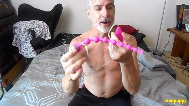 Kinky Richard Lennox uses beads tight