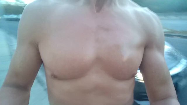 Nude, muscular jerking front rush hour traffic