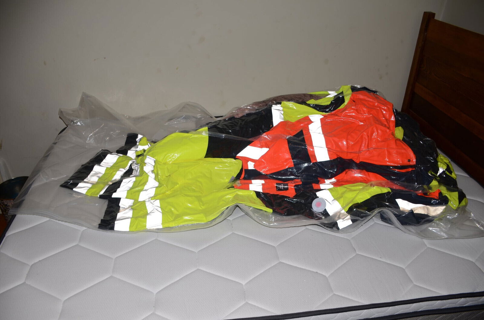 VacPacked hiviz vest with hiviz raincoats sweaty Kevlar Vest
