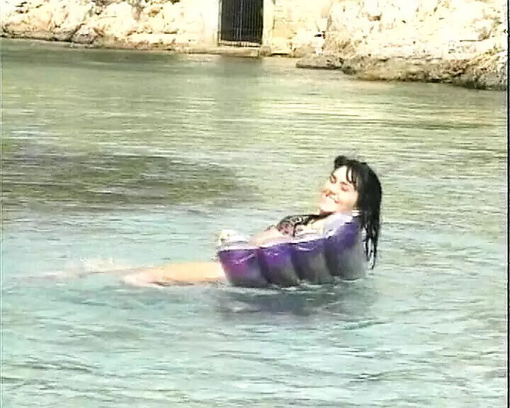 Dark haired German beauty adores fucking beach