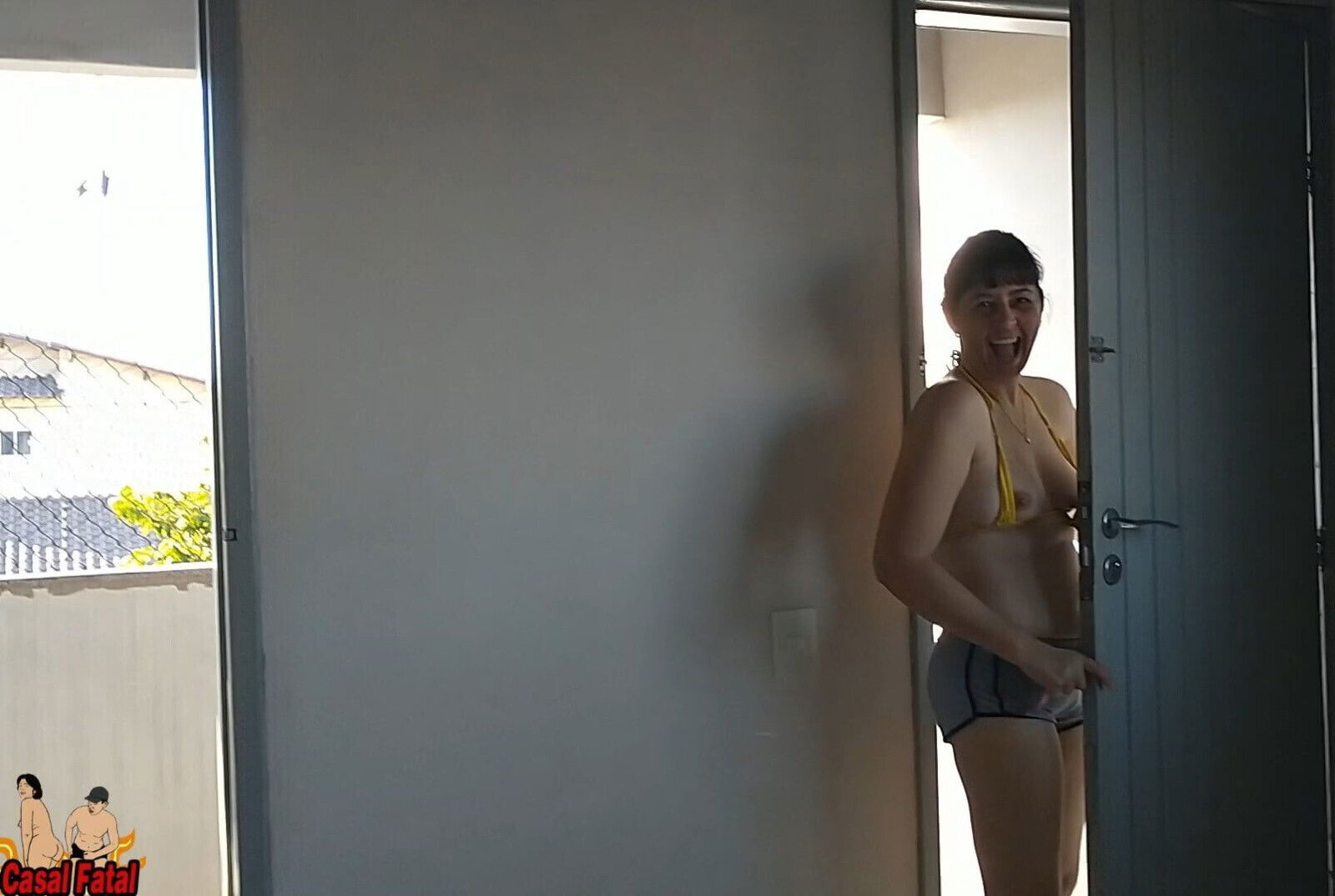 wife answer delivery guys wearing micro biquini. shows nipples balcony their.