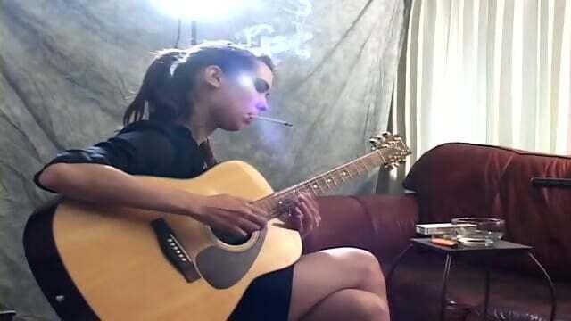 Natashka smoking fetish 120s dangling while playing piano guitar