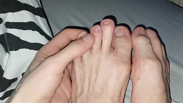 Skinny cute feet fingers stretched bitten nails