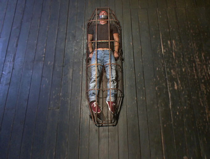 Helpless and caged like an animal