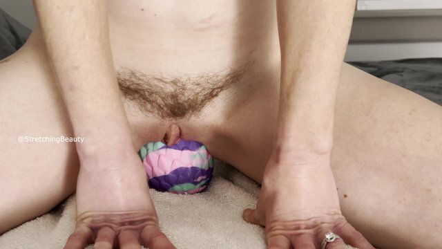 Stretching pussy with dragon