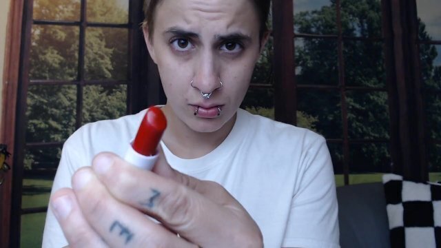 Nose Piercings Applying lipstick