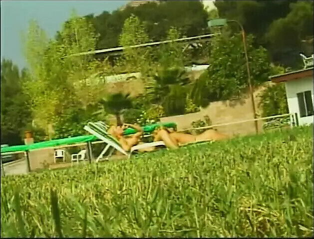 Lesbian teens playing with toys pussies outdoors