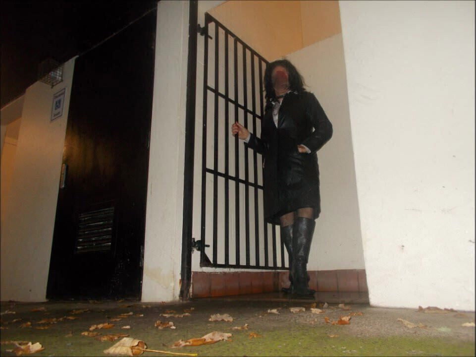 Busty leather transvestite