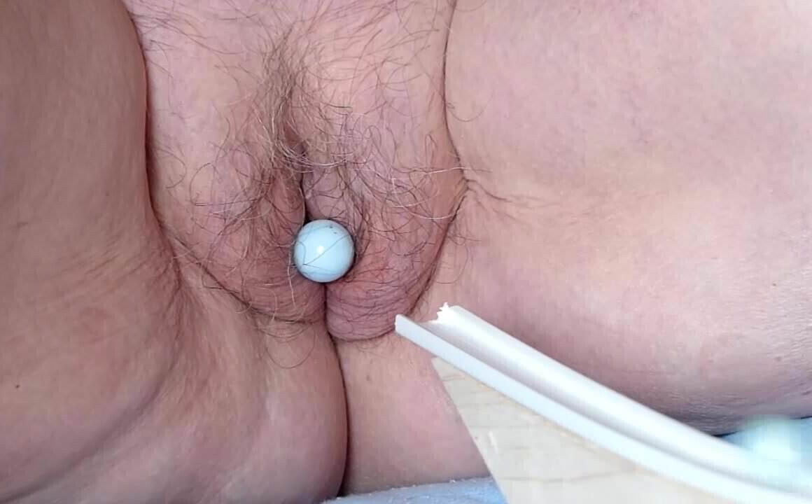 Cunt busting with marbles