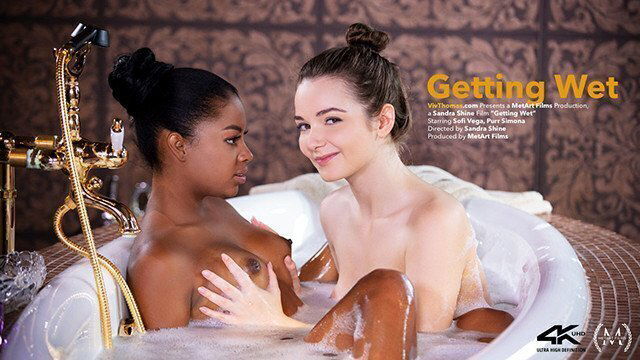 Watch this cute interracial lesbian couple have passionate