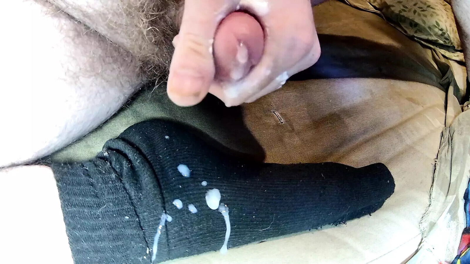 Masturbating wearing black socks