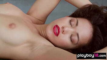 Petite small titted naked Filipino muse Rysha posing with huge leaf